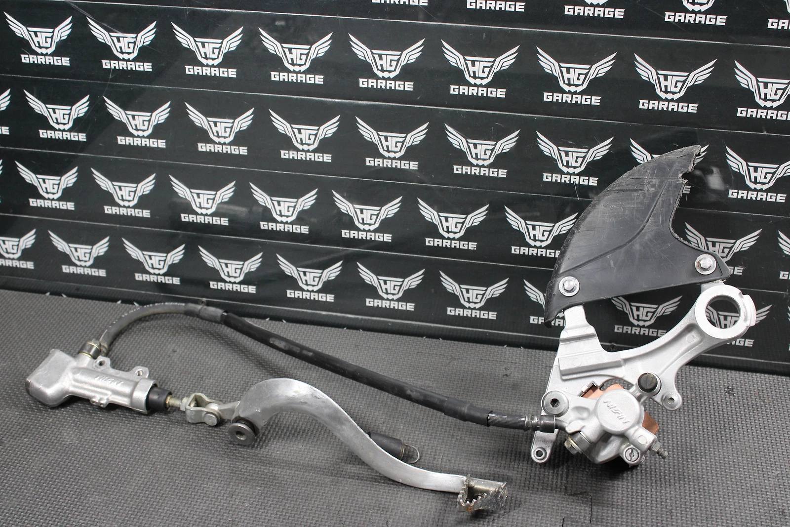 2009 Kawasaki KX250F OEM Nissin Rear Back Brake Caliper Master Cylinder Lever