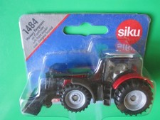 HERE IS A SIKU 1484 DIECAST MODEL MASSEY FERGUSON BLISTER CARD IN MINT CONDITION