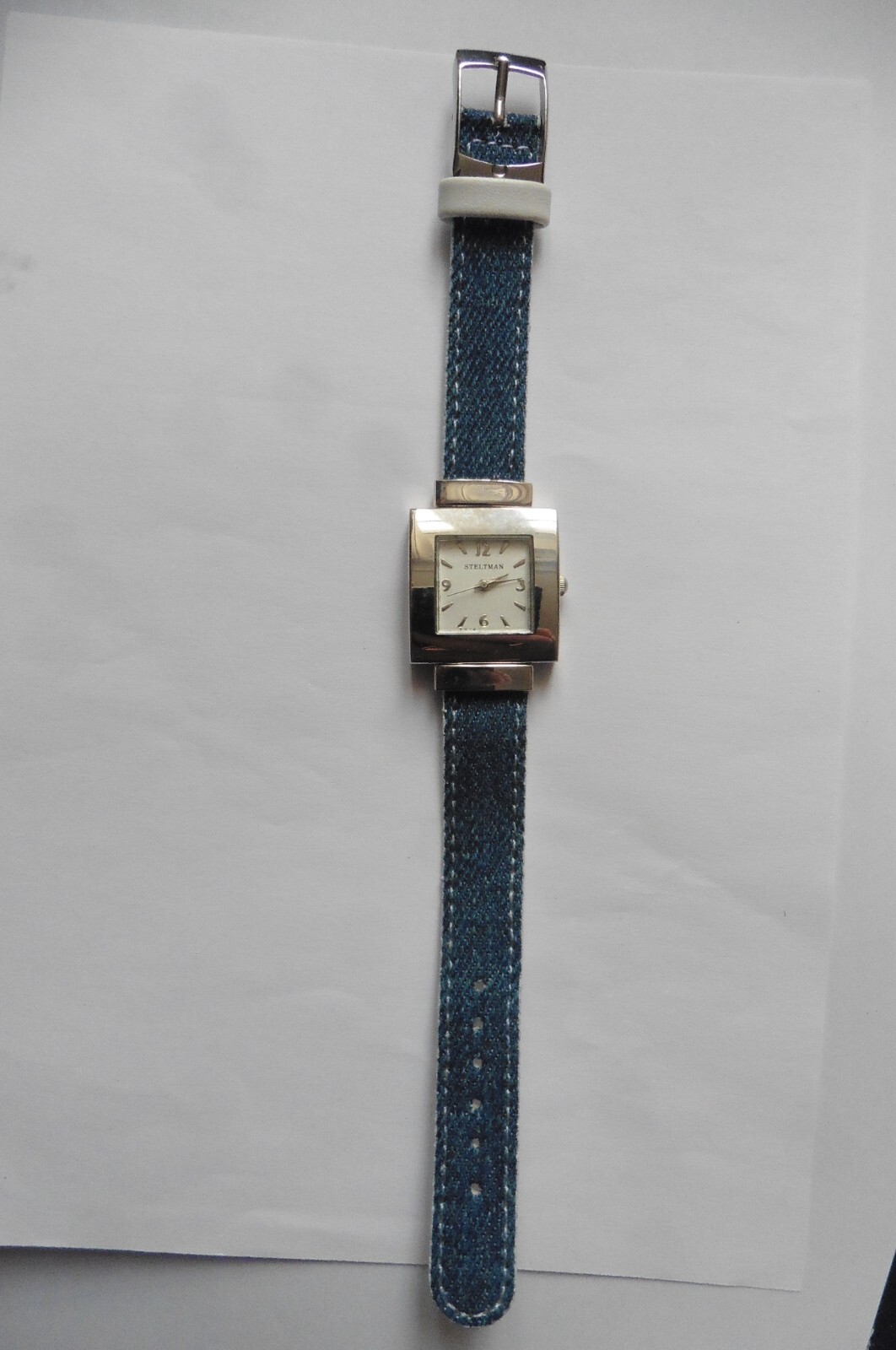 Montre femme réversible Steltman en cuir blanc et tissu jean bleu