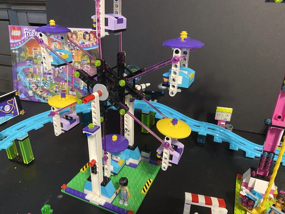 - LEGO Friends Parque de Atracciones 41130 Montaña Rusa Columpios Paseos Puerta Emma Andrea Foto 2 de 4
