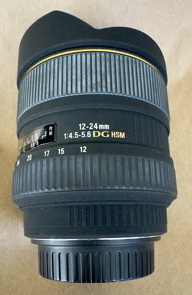 Lente zoom ultra ancho Sigma 12-24 mm f/4,5-5,6 DG HSM, para Canon "Excelente" Foto 4 de 4