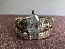 LADY'S DIAMOND WEDDING SET: 5.5GRAMS 14K-YELLOW GOLD, 1-PEAR CUT DIA PD6014451 