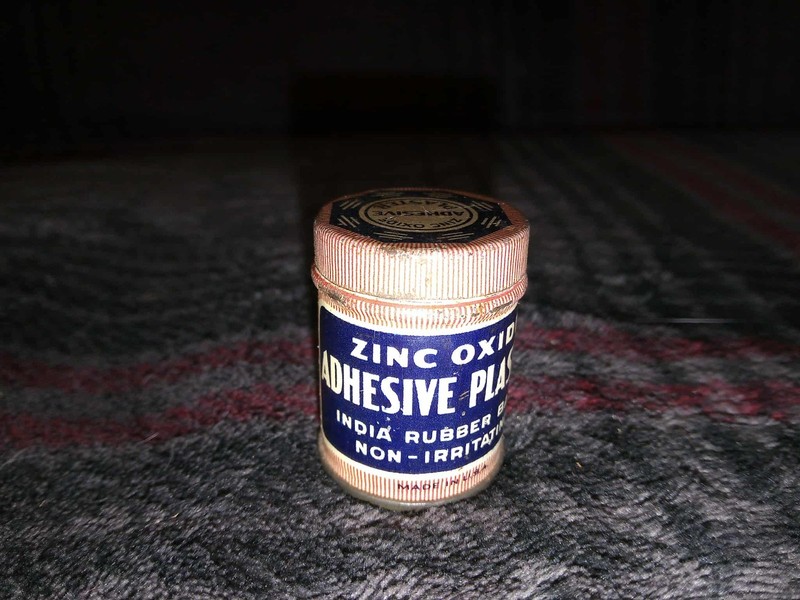 vintage zinc oxide adhesive plaster can empty India rubber base 1 inch tall