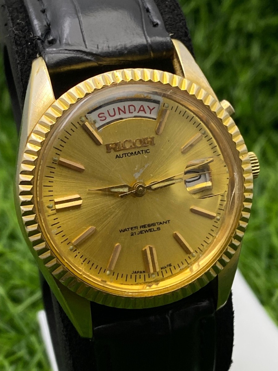 RICOH President 061121 Automatic Fluted Bezel Golden Dial Day/Date