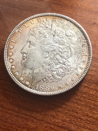 1886 Morgan Silver Dollar - Good  and Toned Circulated US 1 Dollar Coin