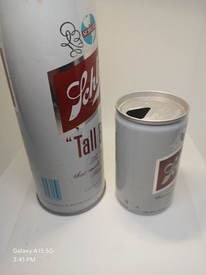 2 schlitz empty beer cans