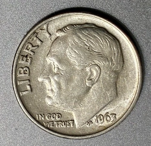 LIGHTLY CIRCULATED 1963 ROOSEVELT DIME. 90% SILVER. A NICE 63 YEAR OLD COIN.