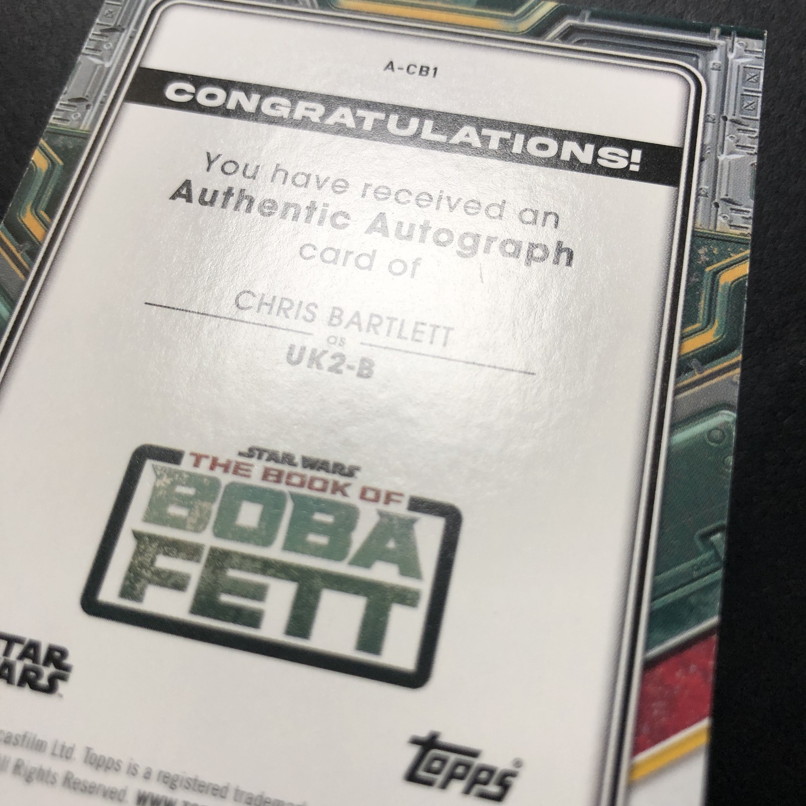 2022 Topps Star Wars the Book of Boba Fett Auto Chris Bartlett UK2-B Red /99 view 3