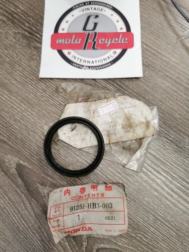 NOS HONDA TRX200SX  DUST SEAL 50.5X62X9 91251-HB3-003  H57
