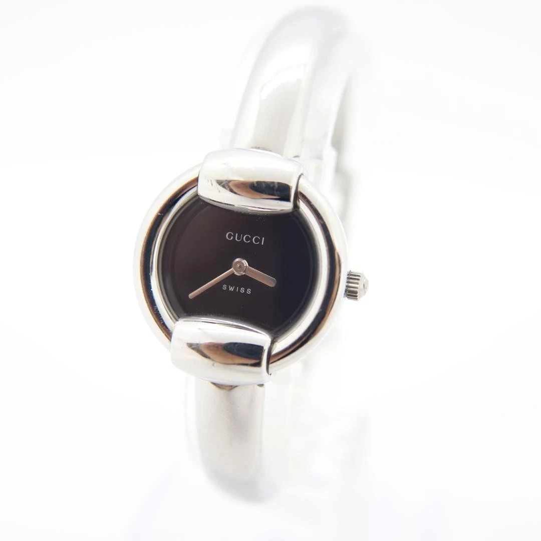 Montre Gucci 1400L quartz noir fabrication suisse ronde vintage femme 25 mm