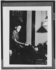Photo:1940s Boy at Typewriter Home Interior Black and White Portrait thumbnail