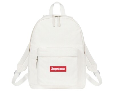 white canvas backpack