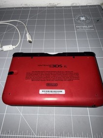 Nintendo 3ds Xl Red Used. Comes with Stylus, 4gb Sd Card, and Charging Cable.