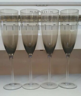4 SMOKE GRAY CHAMPAGNE FLUTES 10 INCHES TALL HOLDS 8 OZS