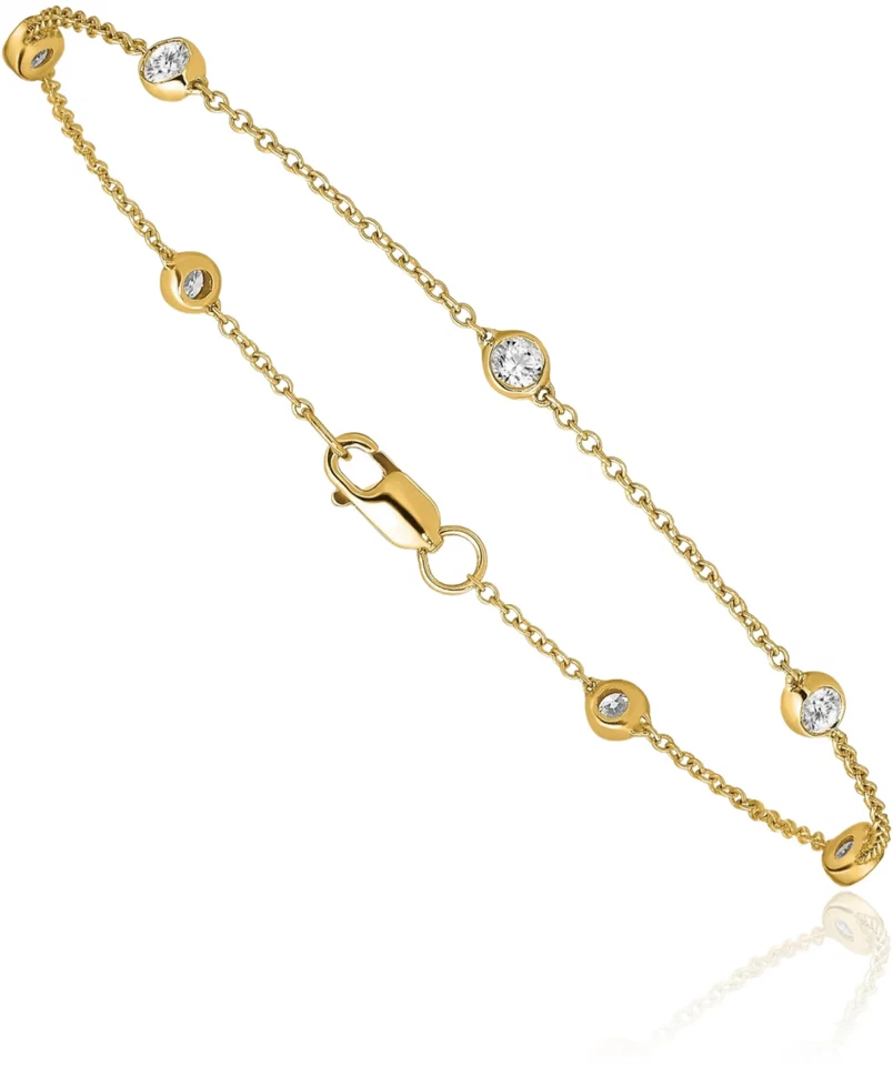 Brazalete de tenis de estación de diamantes de laboratorio de oro amarillo macizo de 14K Foto 2 de 4