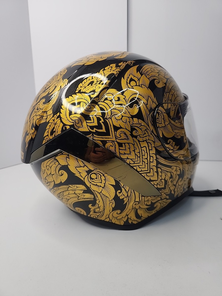 gold and black motorcycle helmet HAX Force Blade Matte M Built to disappear at speed ICON Airform Motorcycle Helmet Gold