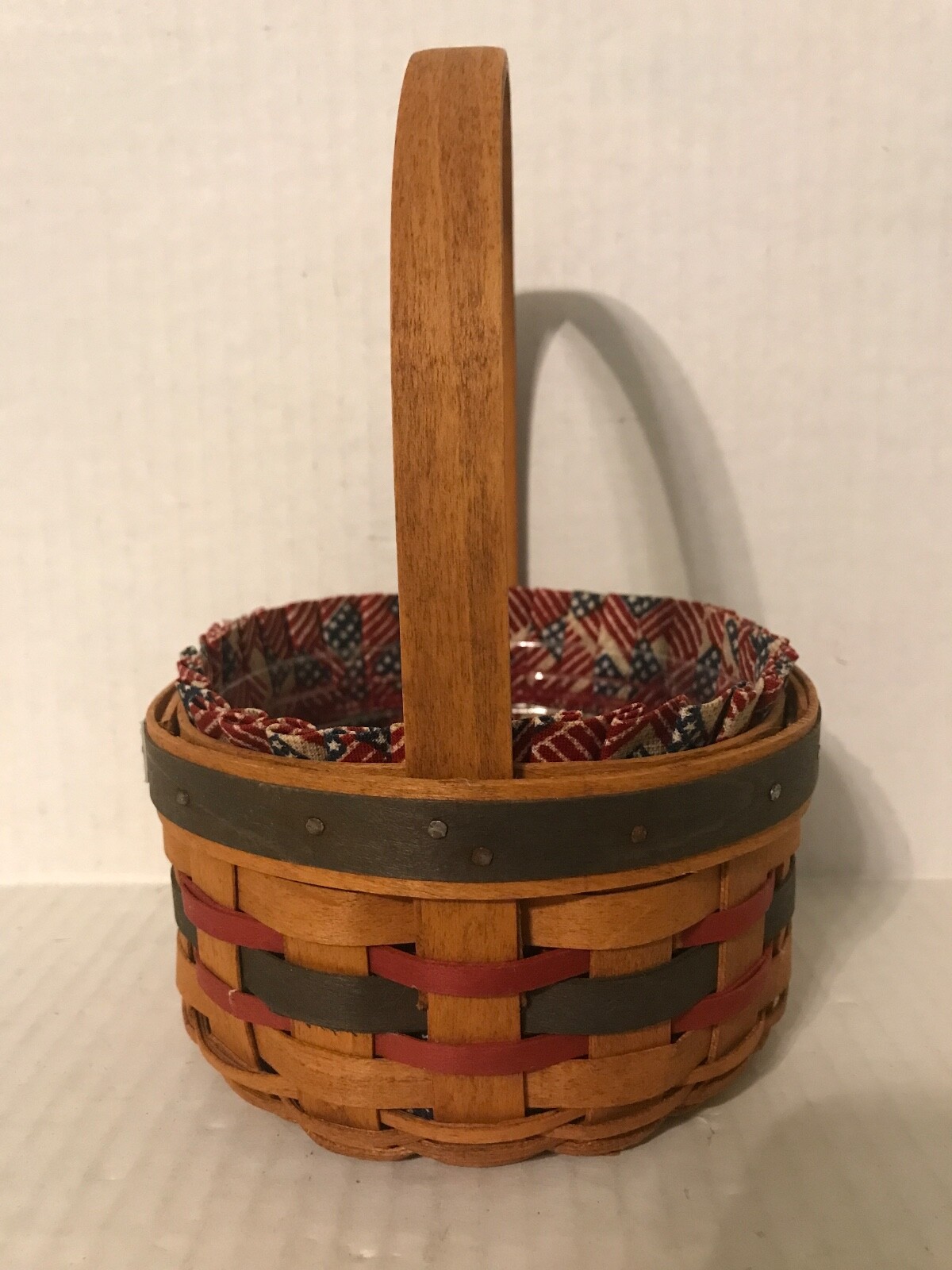 1997 LONGABERGER ROUND INAUGURAL BASKET WITH STATIONARY HANDLE 3" HIGH