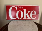Vintage red and white "Enjoy Coke" metal advertising sign