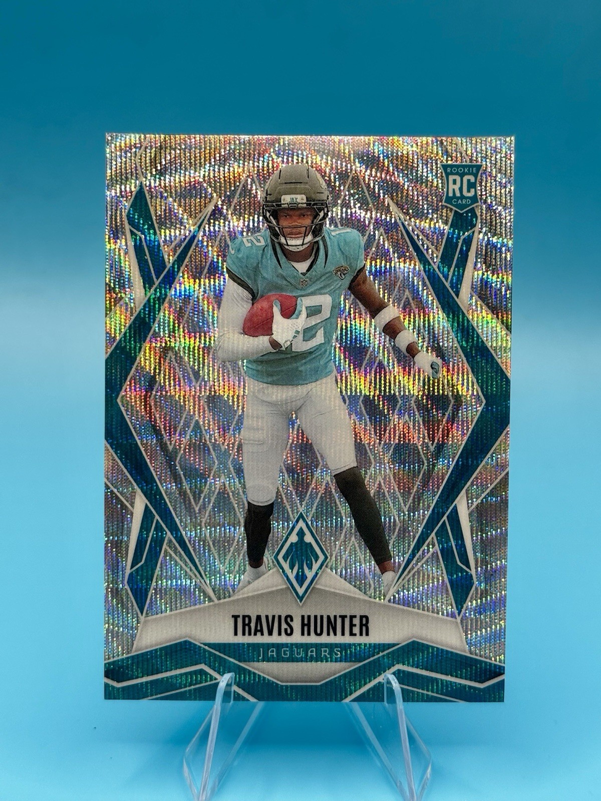 2025 Panini Phoenix - Rookies Travis Hunter #157 Wave /199 (RC)