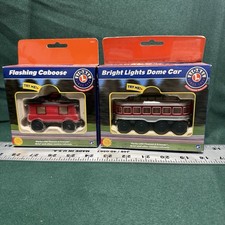Lionel Wooden Railway Bright Lights Dome Car Flashing Caboose NEW Thomas Brio