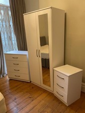 Three Items Of Bedroom Furniture Wardrobe Chest Of Drawers Bedside Table