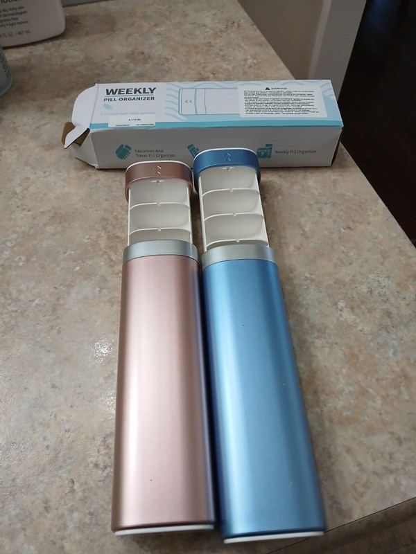  2 pill organizers 7 day Zhuhai  Quin Technology Co.  Very Sturdy Plastic. 