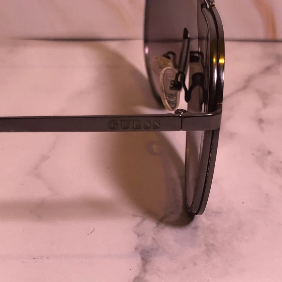 Gafas de sol Guess GF0199 02B negras grises degradadas con marco de metal para hombre 00-00-140 Foto 4 de 4