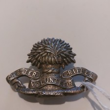 Victorian-era cap badge for the Chester Rifle Volunteers