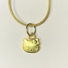 Small Gold Hello Kitty Charm Pendant On A Gold Snake Necklace Chain 