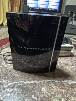 Sony PlayStation 3 80GB Console Bundle Plus 7 Games And Controller.