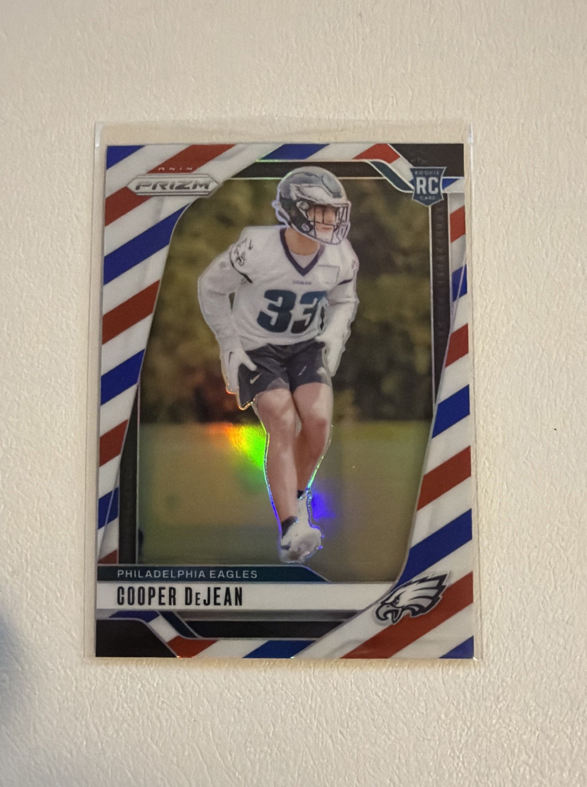 2024 Panini Prizm Football RC Rookie Red White Blue Cooper DeJean #321 Eagles