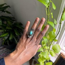 Vintage sterling Turquoise stone ring with silver details
