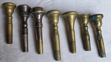 7 old trumpet bugle mouthpieces "Prof. Scherbaum 10 1/2 C" "Hablowetz S1" "GBrH"