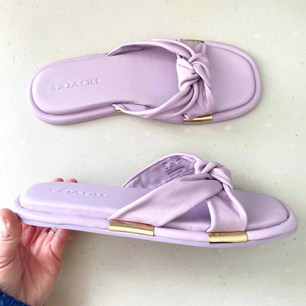Knotted twist store slide sandals