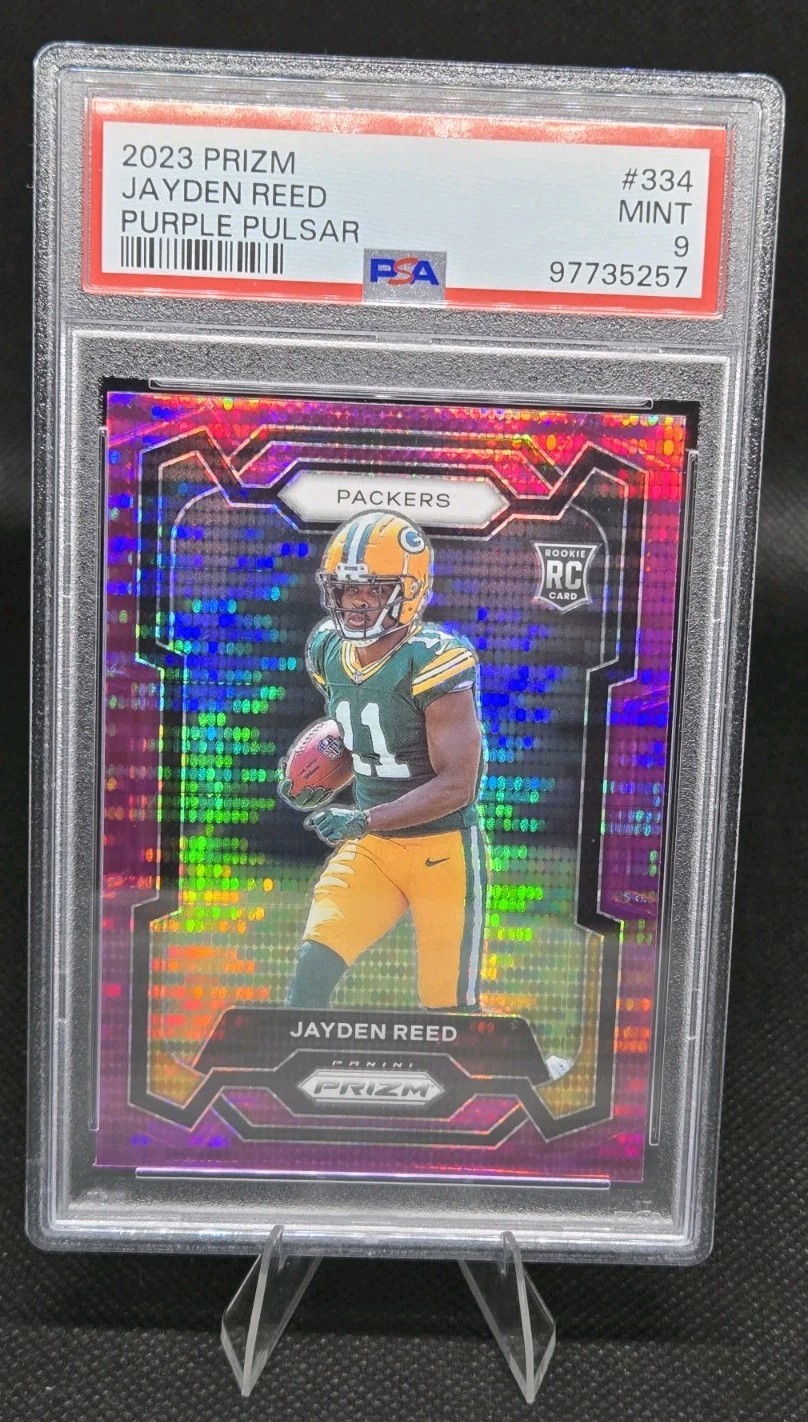 2023 Panini Prizm Jayden Reed Purple Pulsar #334 RC Rookie Packers PSA 9