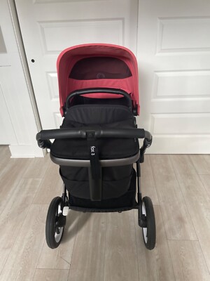 bugaboo fox 3 stroller with bassinet, seat and rain cover. Sunrise red canopy. 