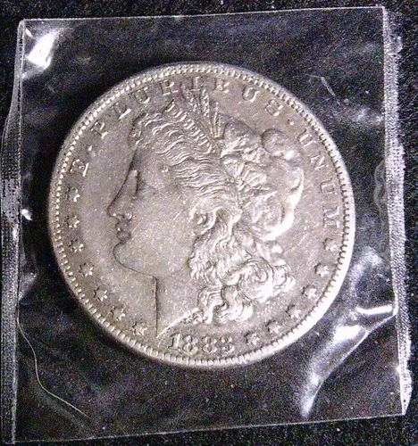 1883-S U.S. SILVER DOLLAR, ORIGINAL XF.