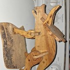 Primitive Hand-Carved Wood triceratops sculpture — photo 1