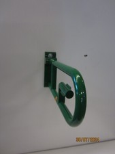 HEWI Stützklappgriff 600mm mit Drehfunktion und Toilettenpapier-halterung Grün