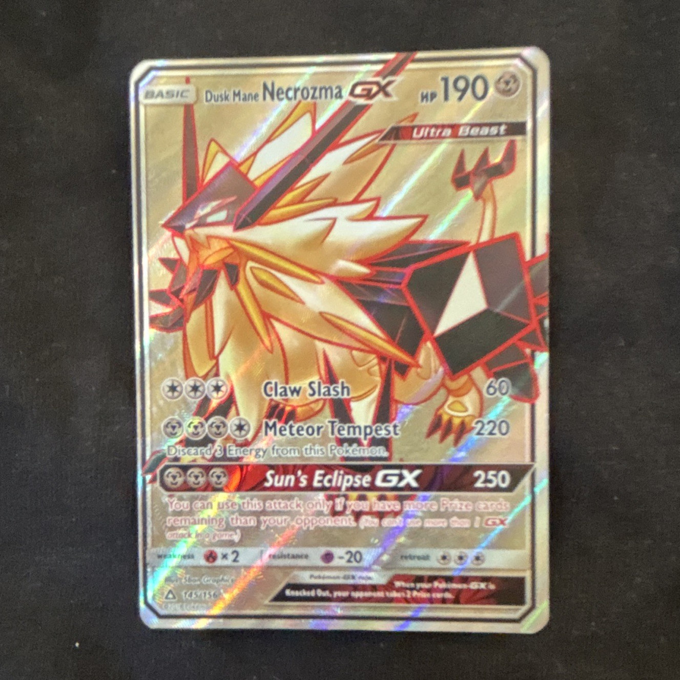 The Pokémon Company Dusk Mane Necrozma GX 145/156 SM-Ultra Prism Holo 190 HP