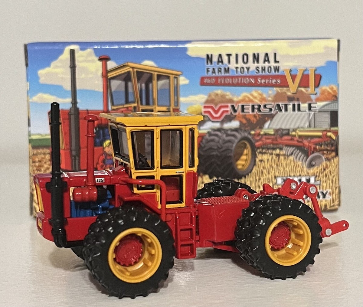 Trattore Giocattolo 1/64 Versatile 125 4WD Con Cabina – Edizione National Farm Show 2023