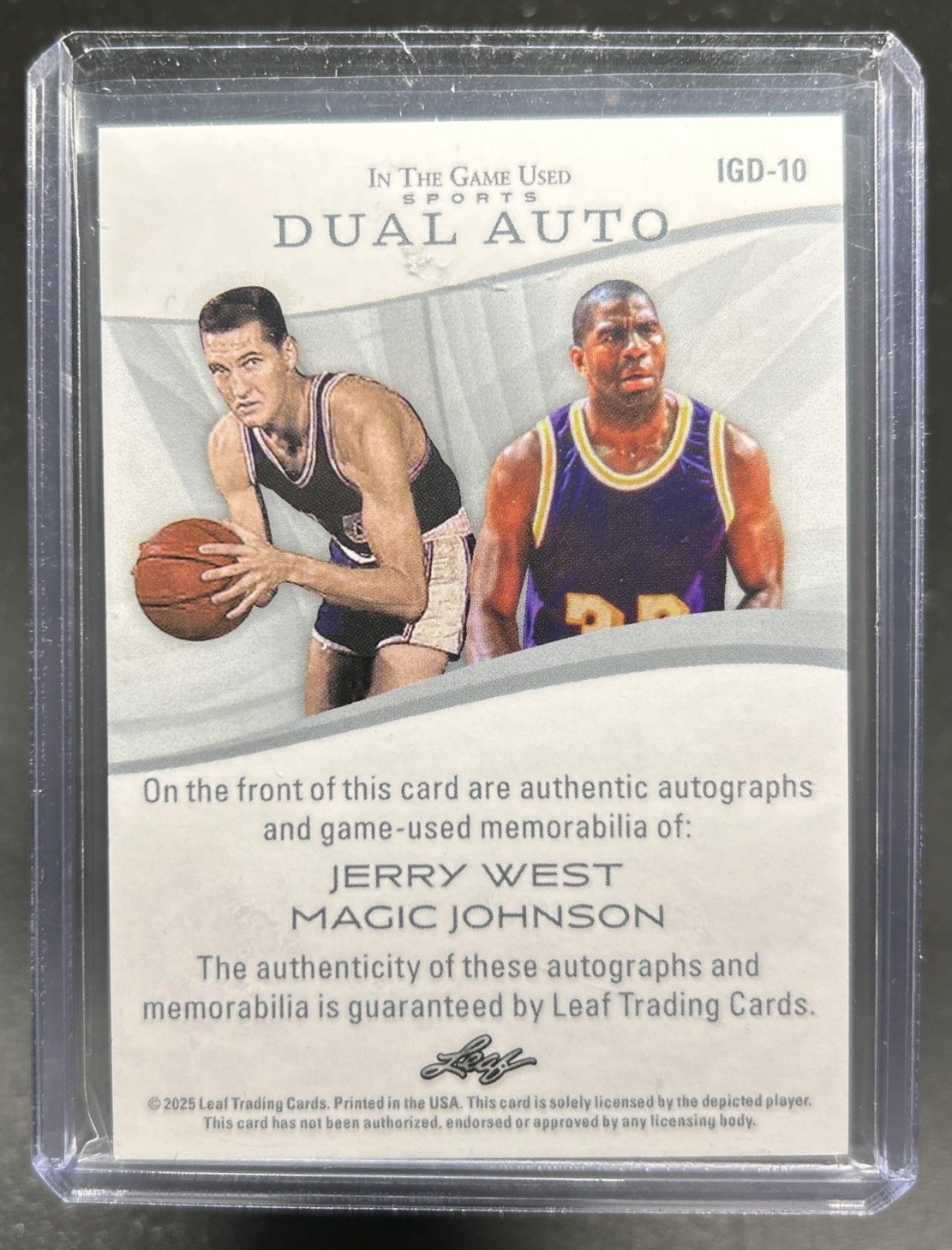 2025 Leaf In the Game Used Jerry West Magic Johnson Dual Jersey Auto Green #1/1 view 2