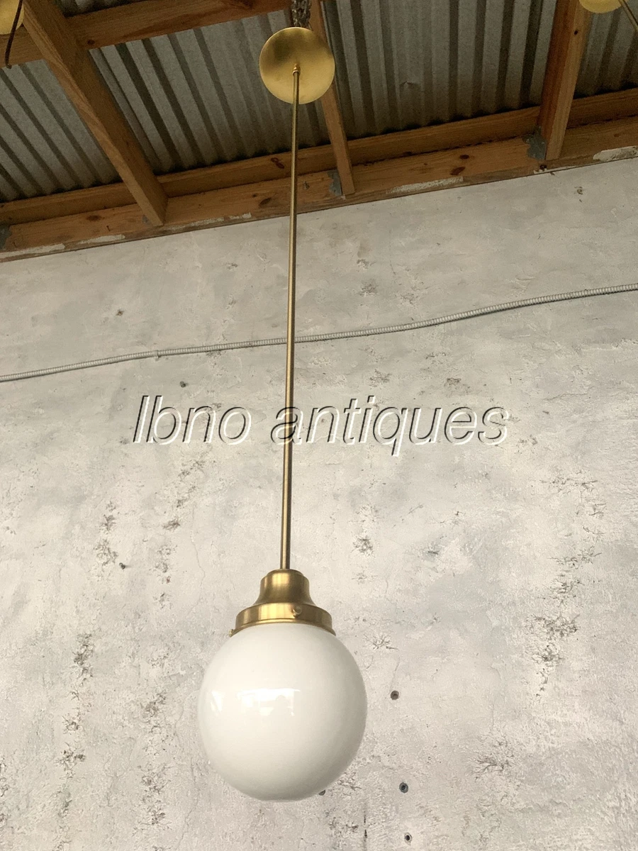 MODERN AND ANTIQUE BRASS AND MILK GLASS GLOBE PENDANT . 43