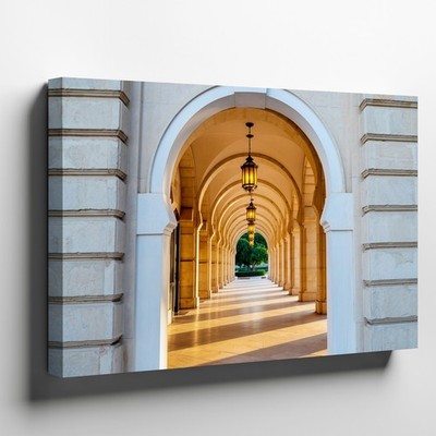 Beautifully Framed Archway Leads Into A Long Corridor Of Evenly Spaced Wall Art