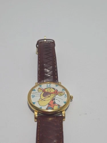 Vintage Timex Disney Winnie the Pooh Tigger wristwatch with leather band.