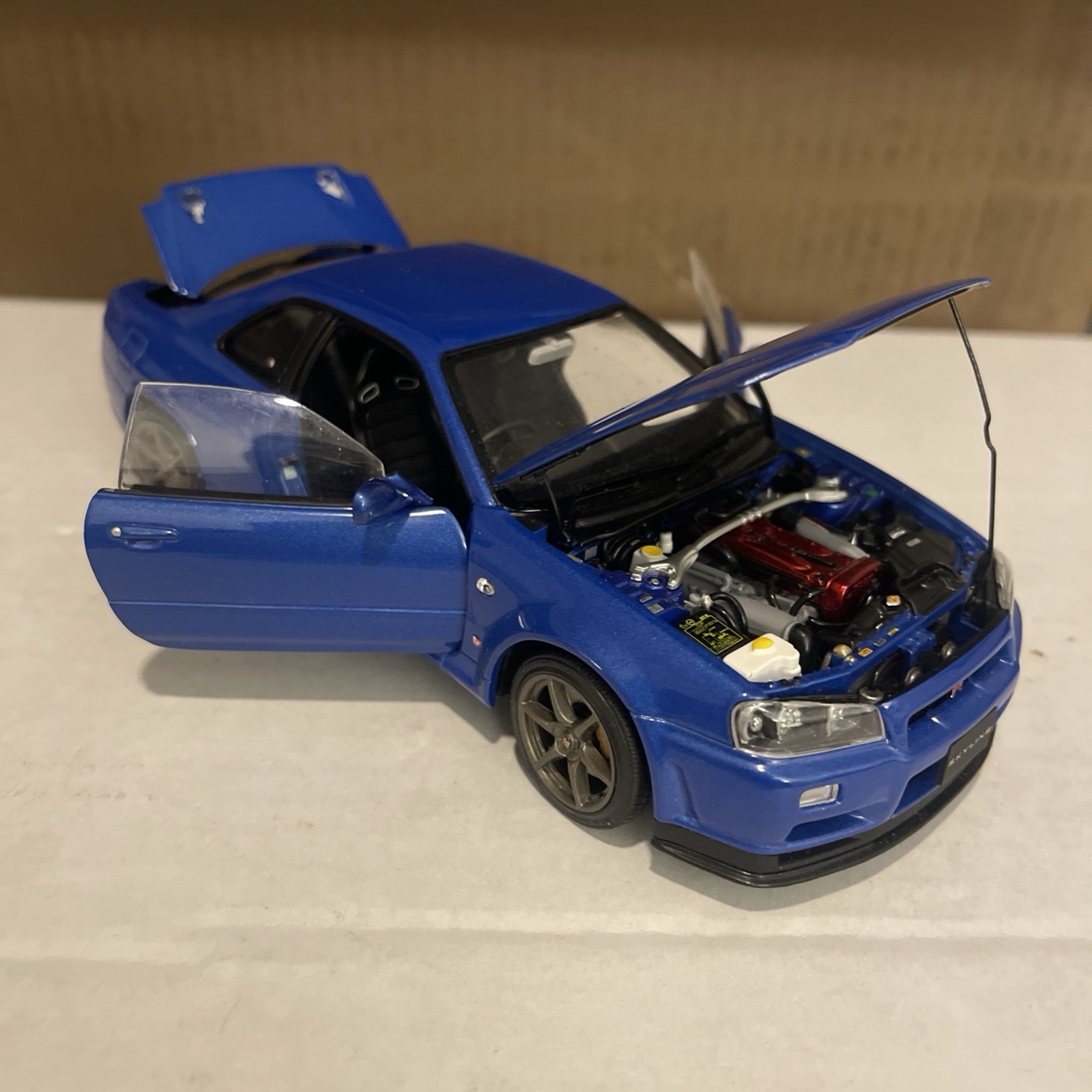 77462 AUTOart 1 18 Nissan NISMO R34 GT-R Z-tune (Bayside Blue) model car