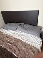 double bed with mattress and headboard 
