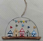 Beach Huts With Bunting Decoration  Seaside Beach Huts  Beach Hut Decoration