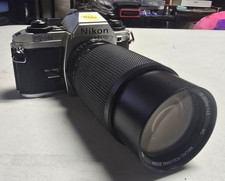 Nikon FG-20 35mm SLR Film Camera With Large Lens