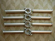 Four Manfrotto Art Alu Autopole clamps/adapters with eight 10" face-outs